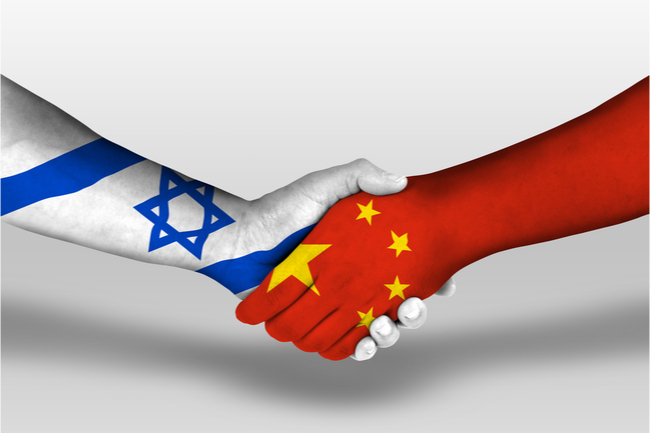 israeli and chinese flags - shaking hands